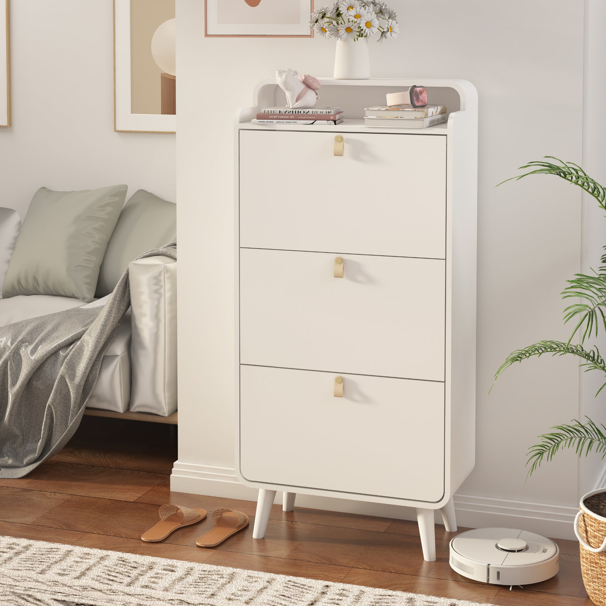 Organize your shoe collection with our Modern Arc Design Shoe Cabinet. With 3 spacious drawers, this cabinet not only maximizes storage space, but also adds a touch of modern elegance to any entryway or outdoor space. Its sleek white finish will complement any decor. Stay organized and stylish with this shoe storage solution!