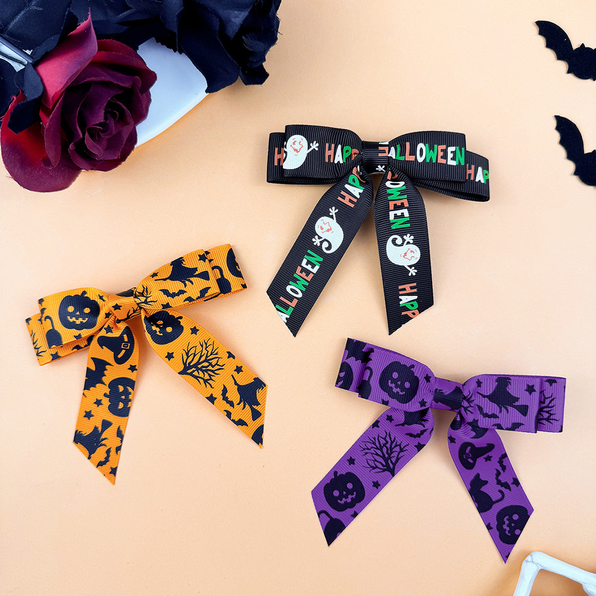 2-Piece Halloween Bow Hair Clip, Get into the spooky spirit with our 2-Piece Halloween Bow Hair Clips! These playful accessories are perfect for adding a touch of festive fun to any costume or outfit. With a variety of cute and quirky designs available, you'll be sure to stand out and have a hair-raisingly good time.