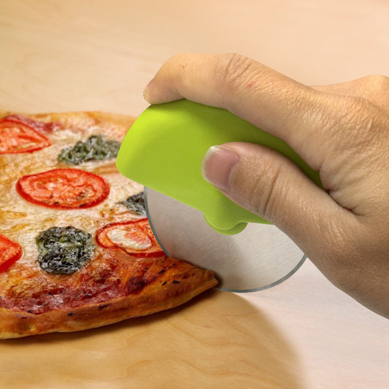 "Pizza Wheel"Take on any pizza with the Pizza Wheel! Slice your way to success and enjoy perfectly cut slices every time. No more struggling with a dull knife or messy hands. Take a risk and elevate your pizza game with our bold and reliable Pizza Wheel. Go ahead, take a slice