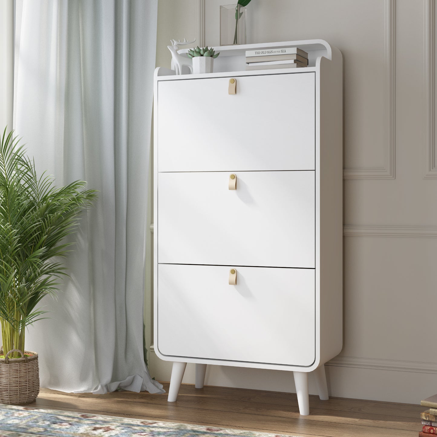 Organize your shoe collection with our Modern Arc Design Shoe Cabinet. With 3 spacious drawers, this cabinet not only maximizes storage space, but also adds a touch of modern elegance to any entryway or outdoor space. Its sleek white finish will complement any decor. Stay organized and stylish with this shoe storage solution!