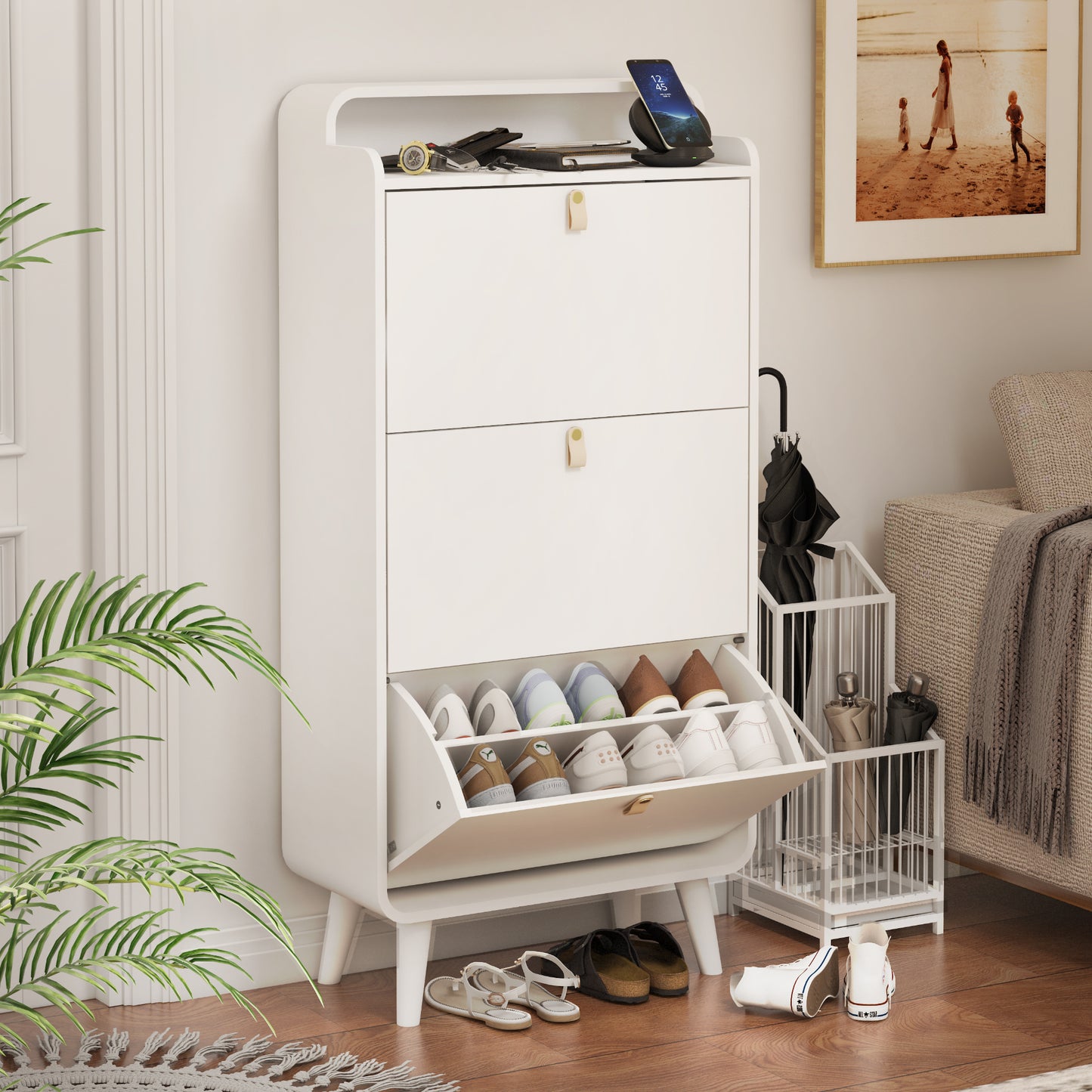 Organize your shoe collection with our Modern Arc Design Shoe Cabinet. With 3 spacious drawers, this cabinet not only maximizes storage space, but also adds a touch of modern elegance to any entryway or outdoor space. Its sleek white finish will complement any decor. Stay organized and stylish with this shoe storage solution!