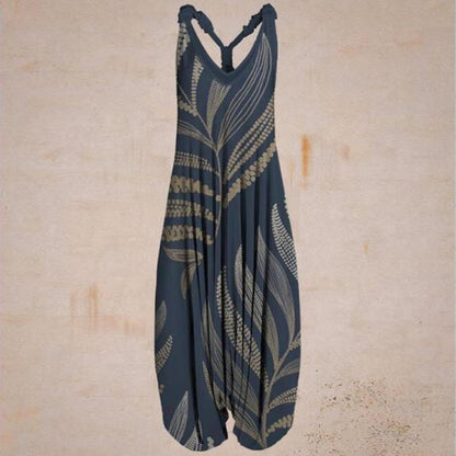 "Ethnic Style Printed Loose Large Size Harem Pants Beach Suspenders Jumpsuit"Elevate your beach style with our Printed Loose Harem Pants Jumpsuit! With a fashionable print and a comfortable loose fit, this jumpsuit is perfect for beach days. The suspenders add a unique touch and provide extra support. Embrace the freedom and style of our Large Size Harem Pants Jumpsuit