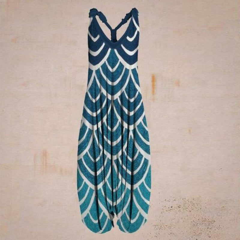 "Ethnic Style Printed Loose Large Size Harem Pants Beach Suspenders Jumpsuit"Elevate your beach style with our Printed Loose Harem Pants Jumpsuit! With a fashionable print and a comfortable loose fit, this jumpsuit is perfect for beach days. The suspenders add a unique touch and provide extra support. Embrace the freedom and style of our Large Size Harem Pants Jumpsuit