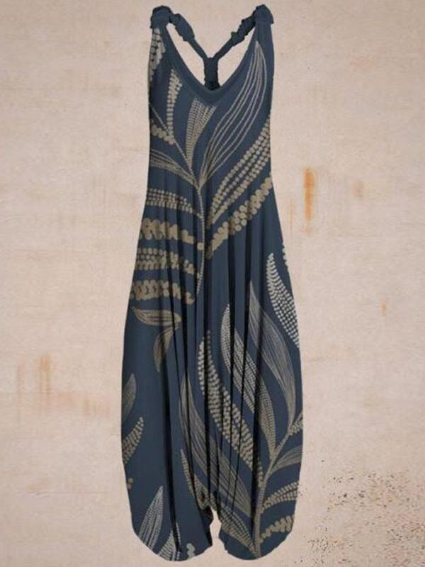 "Ethnic Style Printed Loose Large Size Harem Pants Beach Suspenders Jumpsuit"Elevate your beach style with our Printed Loose Harem Pants Jumpsuit! With a fashionable print and a comfortable loose fit, this jumpsuit is perfect for beach days. The suspenders add a unique touch and provide extra support. Embrace the freedom and style of our Large Size Harem Pants Jumpsuit