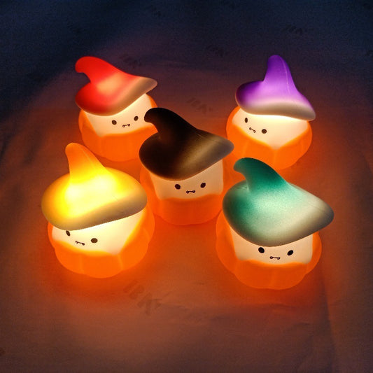 "Ghost Pumpkin Small Night|Light Halloween Silicone Light" "Illuminate your Halloween nights with our Ghost Pumpkin Small Night Light! Made of high-quality silicone, it's durable, portable, and easy to use. Its cute ghost pumpkin design adds a touch of spooky charm to any room. Get yours now and light up your Halloween festivities!" 🎃"👻"