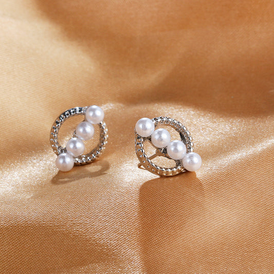 "Cultured Pearl Stud Earrings, handcrafted with the highest quality pearls, perfect for everyday wear and special occasions, available in various sizes."