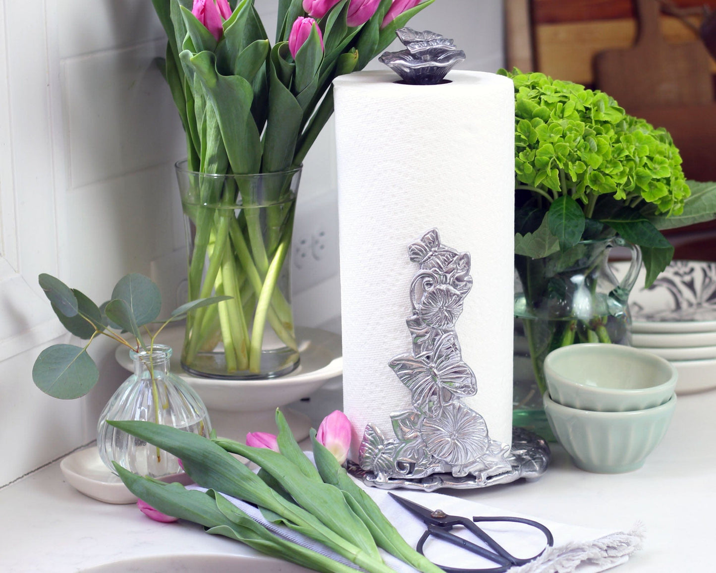 Add a touch of whimsy to your kitchen with our Butterfly Paper Towel Holder! This elegant and functional piece features a beautifully detailed butterfly design that is sure to impress your guests. Keep your paper towels within reach while adding a stylish and unique element to your space