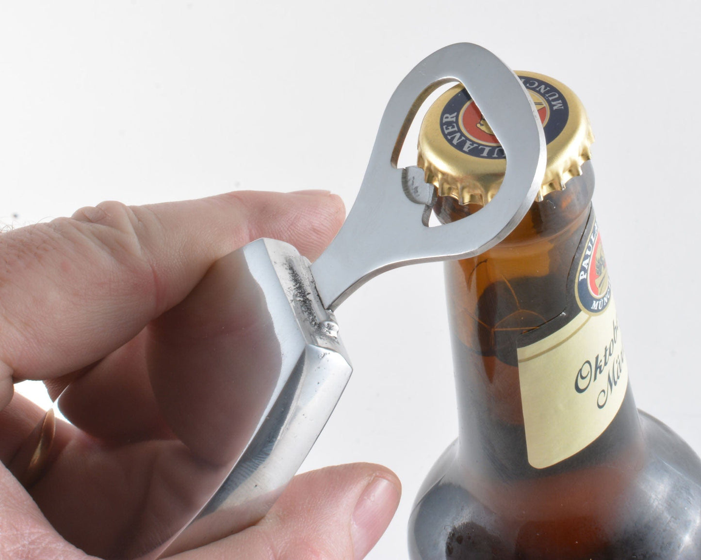 "Engravable Bottle Opener"Introducing our Engravable Bottle Opener, the perfect gift for any beer lover! This sleek and stylish bottle opener is not only functional, but can also be personalized with a special message or initials. Add a unique touch to your next gift giving occasion with this one-of-a-kind item. Cheers to the perfect present!"