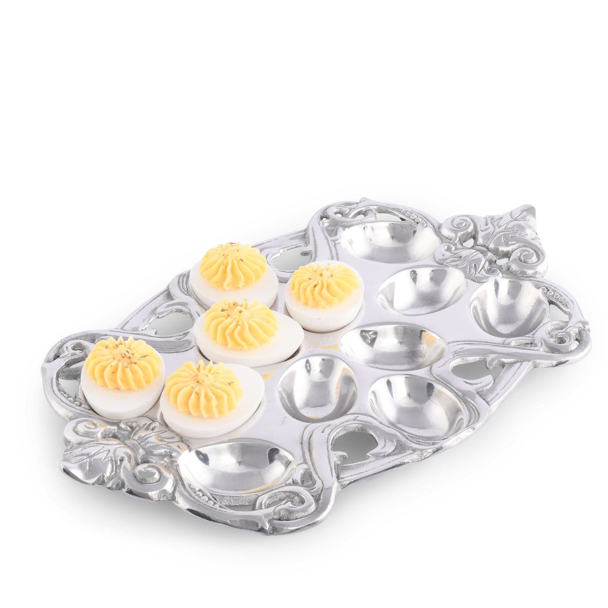 "Fleur-De-Lis Deviled Egg Holder"Make your deviled eggs stand out with our Fleur-De-Lis Deviled Egg Holder. Its elegant design adds a touch of sophistication to any gathering. Impress your guests with this unique and functional serving piece. Elevate your entertaining experience with our deviled egg holder!"