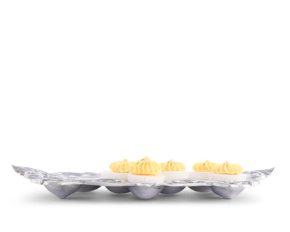 "Fleur-De-Lis Deviled Egg Holder"Make your deviled eggs stand out with our Fleur-De-Lis Deviled Egg Holder. Its elegant design adds a touch of sophistication to any gathering. Impress your guests with this unique and functional serving piece. Elevate your entertaining experience with our deviled egg holder!"