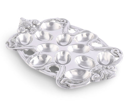 "Fleur-De-Lis Deviled Egg Holder"Make your deviled eggs stand out with our Fleur-De-Lis Deviled Egg Holder. Its elegant design adds a touch of sophistication to any gathering. Impress your guests with this unique and functional serving piece. Elevate your entertaining experience with our deviled egg holder!"