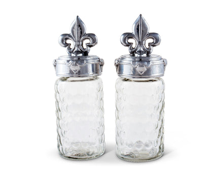 "Fleur-De-Lis Salt and Pepper Set"Spice up your meals with the elegant Fleur-De-Lis Salt and Pepper Set! Featuring the iconic French symbol, this set adds a touch of charm to any dining experience. Its functionality and design make it a must-have for any kitchen or dining room. Add a touch of sophistication to your meals with this unique set"