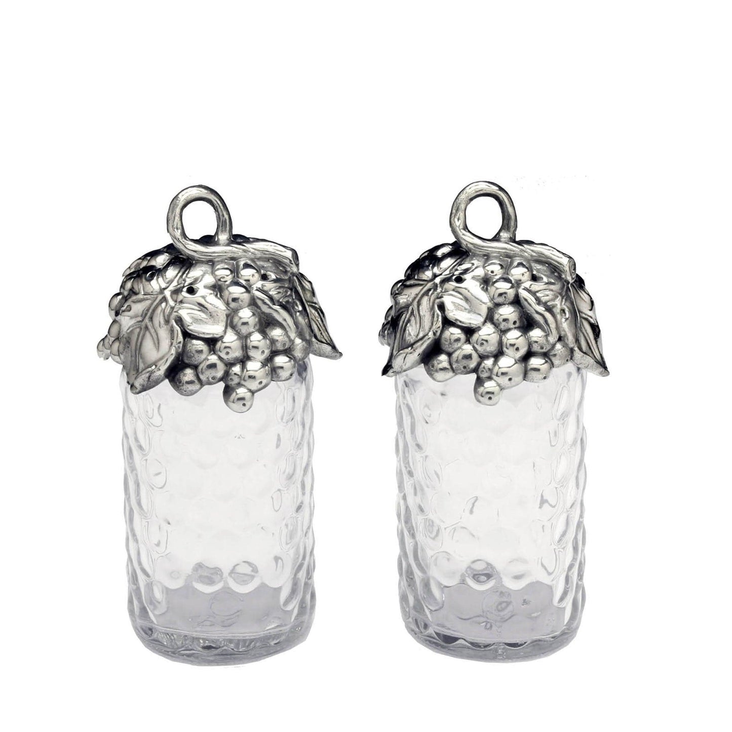 "Grape Salt and Pepper Set"Add a touch of sophistication to your table with this Grape Salt and Pepper Set from Arthur Court. The top of these dispensers features a looping vine adorned with leaves and grapes, creating a unique and elegant design. Handcrafted from aluminum, these pieces will elevate any setting with their simple yet luxurious appearance. Measuring at a diameter of 2.0" and a height of 5.75", these easily refillable dispensers can be dusted with a damp cloth and will not tarnish over time"