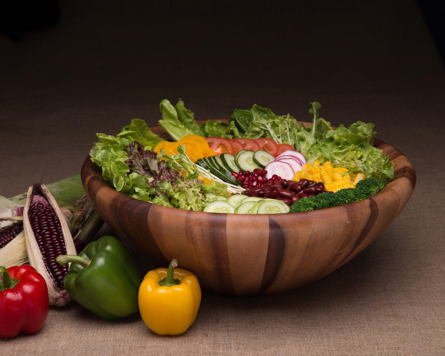 "Salinas Style Wooden Acacia Salad Bowl Large"Serve your salads in style with our Salinas Style Wooden Acacia Salad Bowl! Made from durable acacia wood, this large bowl adds a touch of rustic elegance to any table setting. Its natural wood grain and earthy tones bring warmth and charm to your meals. Perfect for both formal dinner parties and casual family meals."