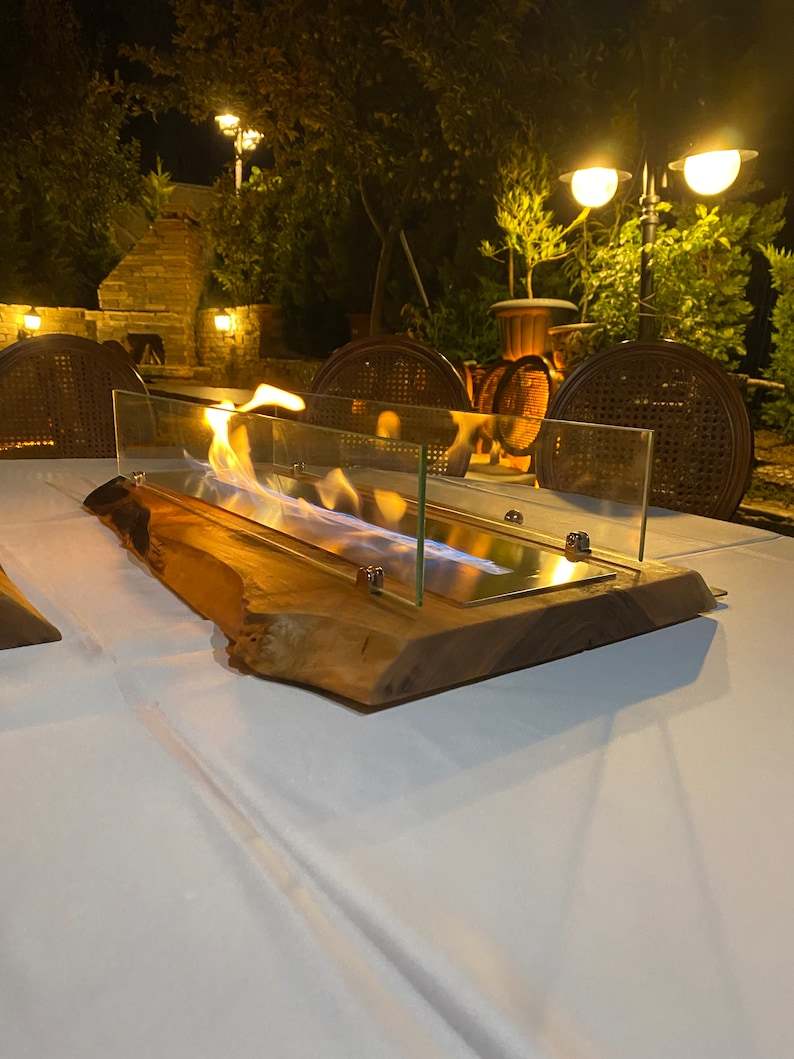 Black Mega Large Handmade Table Top Fire Pit Bio Ethanol Fireplace - Black Mega Large Handmade Table Top Fire Pit Bio Ethanol Fireplace " Elevate your outdoor gatherings with our Handmade Table Top Fire Pit Bio Ethanol Fireplace. This stunning fireplace is not only handcrafted, but also uses clean burning bio ethanol fuel for an eco-friendly and hassle-free experience. Bring warmth, ambiance, and style to any outdoor space with this convenient and visually appealing addition" 