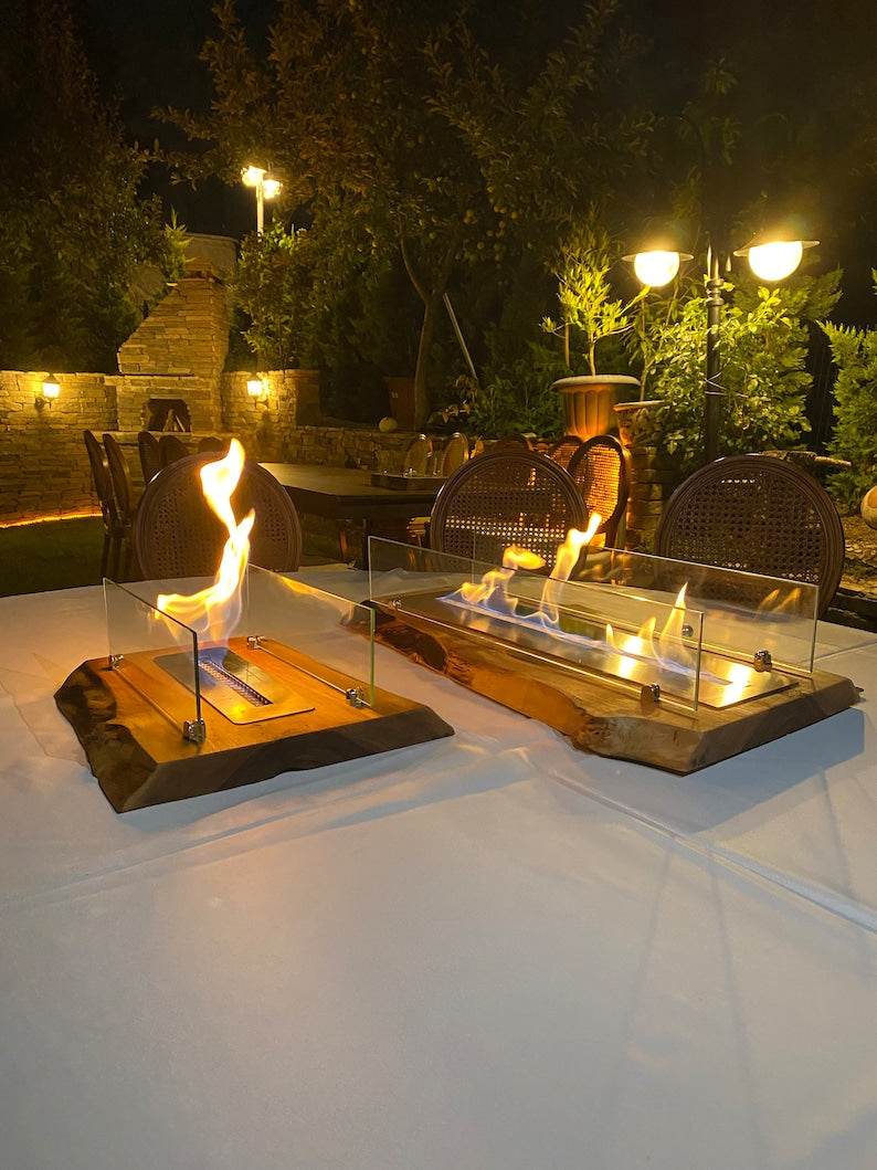 Black Mega Large Handmade Table Top Fire Pit Bio Ethanol Fireplace " Elevate your outdoor gatherings with our Handmade Table Top Fire Pit Bio Ethanol Fireplace. This stunning fireplace is not only handcrafted, but also uses clean burning bio ethanol fuel for an eco-friendly and hassle-free experience. Bring warmth, ambiance, and style to any outdoor space with this convenient and visually appealing addition" 