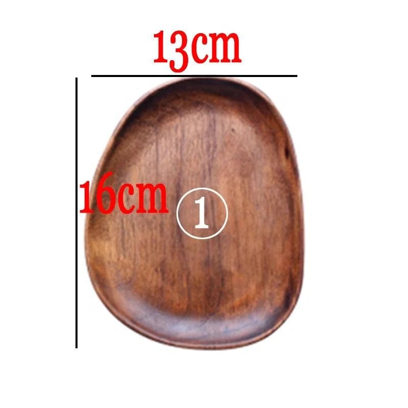 Whole Wood Irregular Oval Solid Wood Plate,Unleash your adventurous spirit with our Whole Wood Irregular Oval Solid Wood Plate. Made from the finest quality solid wood, this unique plate will add a touch of boldness to your kitchen. The irregular oval shape adds an unexpected twist, making it perfect for those who like to take risks in the kitchen - Melissas Collectibles and More