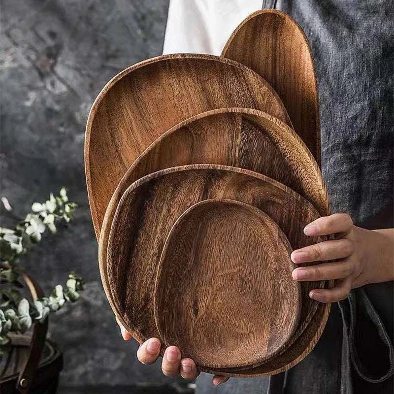 Whole Wood Irregular Oval Solid Wood Plate,Unleash your adventurous spirit with our Whole Wood Irregular Oval Solid Wood Plate. Made from the finest quality solid wood, this unique plate will add a touch of boldness to your kitchen. The irregular oval shape adds an unexpected twist, making it perfect for those who like to take risks in the kitchen - Melissas Collectibles and More